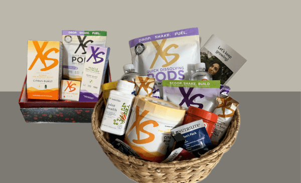 A personalized gift basket, filled with fitness products like no-mess protein pods, muscle multiplier, pre-workout boost & CBD pro cream. Fun gift idea, best gift baskets.