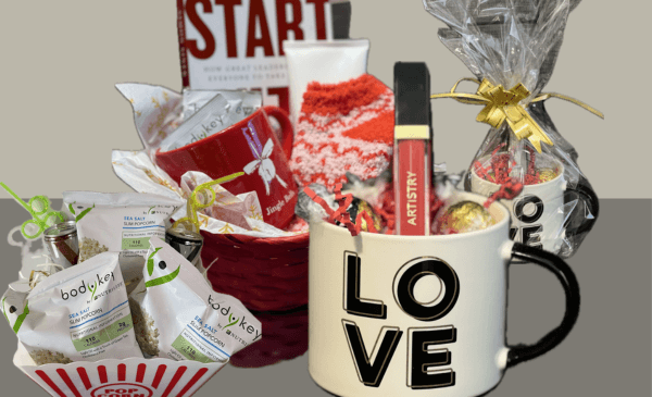 Picture of Customized gift baskets. The name of the gift baskets are The Movie Night, Love Cup and Starter Basket. The gift baskets features popcorn, root beer energy drinks, a light-up lip gloss, a cute mug, candy, tea, lotion, socks, and a book. A great gift idea!